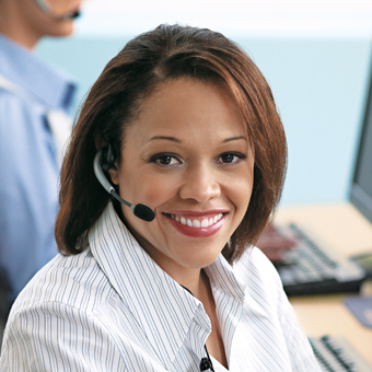 A young ethnic nurse on the phone. 